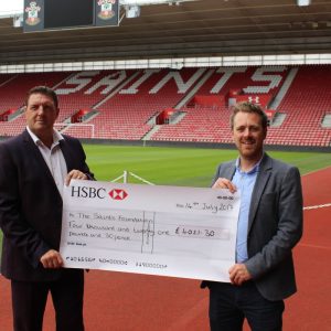 Meachers Global Logistics presents Saints Foundation with cheque