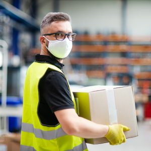 warehouse operative wearing facemask