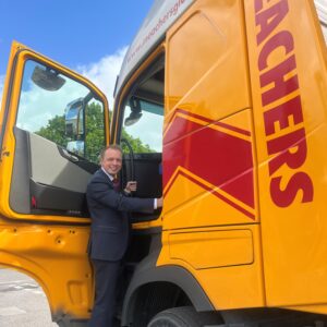Darren Paffey climbing into a Meachers Truck